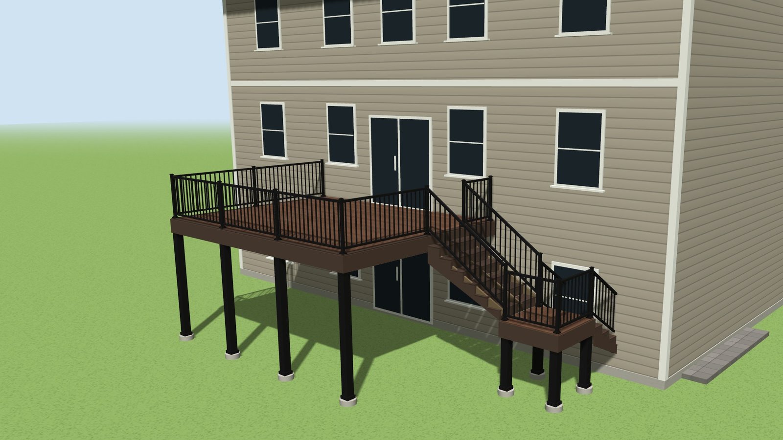 Two-story composite deck with black aluminum railing and a turned stair with landing